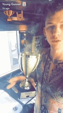 Mgk Machine Gun Kelly GIF - Mgk Machine Gun Kelly Drinking Out A Champion Cup GIFs