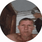 a man without a shirt in a circle