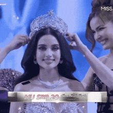 miss mu sbr 20 is being crowned on stage