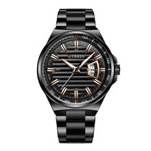 a black curren watch with a stainless steel bracelet