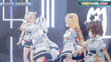 a group of anime girls are dancing in front of a sign that says secret garden .