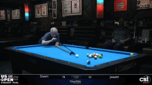 a pool table with a blue cloth and the words diamond on it