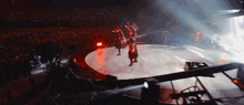 a crowd of people watching a band perform on stage