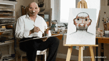 a man wearing a mask is painting a picture of a man