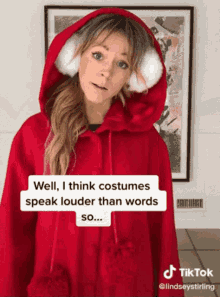 Lindsey Stirling Shrugs GIF - Lindsey Stirling Shrugs Costume GIFs