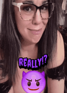 a woman wearing glasses and a purple devil smiley face says really