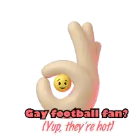 a hand is holding a yellow smiley face and the words gay football fan yup they 're hot