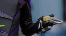 a close up of a person 's hand holding something