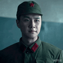 a man in a military uniform has a red star on his hat and a netflix logo on his chest