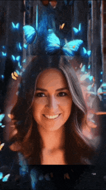 a woman with blue butterflies on her head smiles