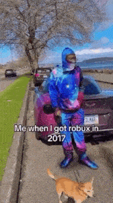 a man in a galaxy suit is standing next to a pink car .