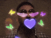 a close up of a man 's face with light coming out of his eyes and mouth .