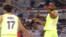 a basketball player with the number 17 on the back of his shirt