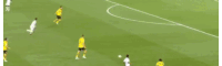 soccer players on a field with an oppo advertisement in the background