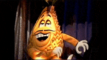 a cartoon character with a big smile on his face and a crown on his head