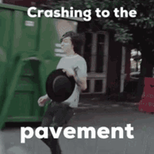crashing to the pavement falling