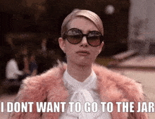 a woman wearing sunglasses and a fur coat says `` i dont want to go to the jar ''