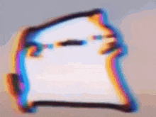a blurry picture of a person 's face with a rainbow background