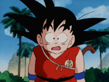 a cartoon character named goku is wearing a red shirt with a turtle on it
