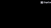 a blue light is shining on a dark background with the caption capcut