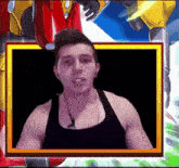 a man in a black tank top is in a picture frame with a cartoon character in the background