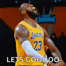 lebron james is wearing a yellow lakers jersey and screaming during a basketball game .