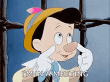 pinocchio is making a face and saying `` i 'm in a meeting '' while holding his nose .