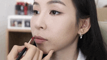 Putting Lipsticks Tina Yong GIF - Putting Lipsticks Tina Yong Applying Lipsticks GIFs