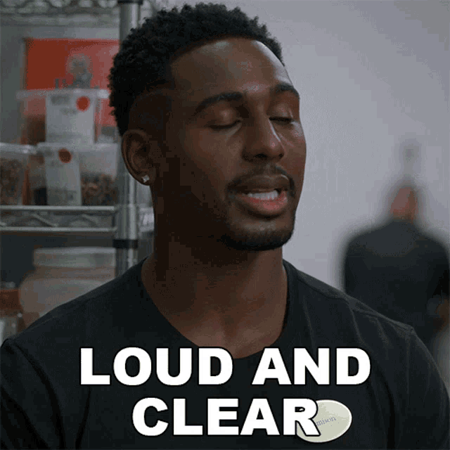 a man in a black shirt says 