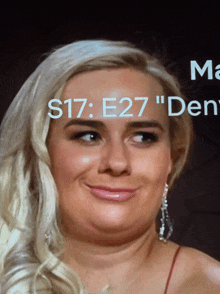 a close up of a woman 's face with the words s17 e27 " den " on the top