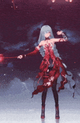 a girl in a red dress holding a red wand