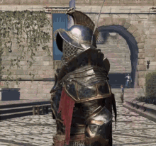 a knight in armor is standing in front of a brick building
