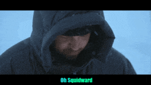 a man wearing a hooded jacket with the words oh squidward above him