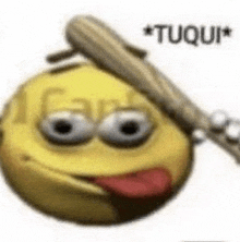 a yellow smiley face is sticking its tongue out and holding a bat .