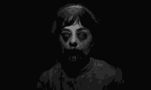 a black and white photo of a scary woman with blood coming out of her eyes and mouth .