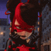 a ladybug from miraculous ladybug is wearing a red mask and a bun .