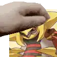 a close up of a person 's hand holding a cartoon character .