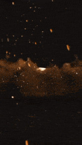 a large explosion in the sky with a glowing light coming out of it
