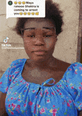maya runoo shakira is coming to arrest you written on a picture of a woman