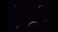 a person is standing in the dark with a flashlight shining on them .