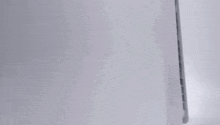 a close up of a playstation ps5 with a white background