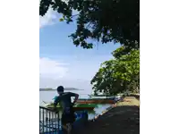 a man wearing a shirt that says ' scuba ' on it