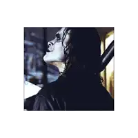 a close up of a person with long hair