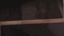 a close up of a knife with blood coming out of it
