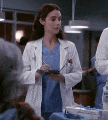 Greys Anatomy Jules Millin GIF - Greys Anatomy Jules Millin Write GIFs