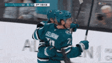 a hockey player named celebroni is hugging another player on the ice