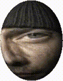 a pixelated image of a man 's face in a circle