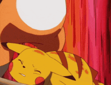 a pikachu is laying down in front of a red background