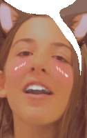 a close up of a woman 's face with a speech bubble