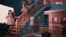 two women standing on a set of stairs with a netflix logo on the bottom right